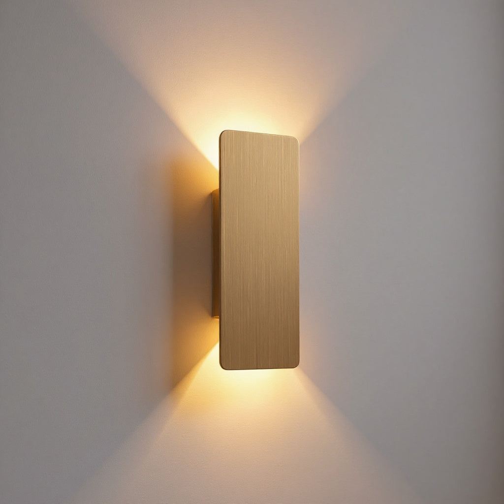 Lume Brass Wall Sconce — studio shot